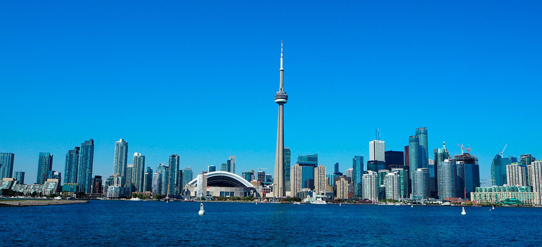 Toronto skyline by day seen from the sea.