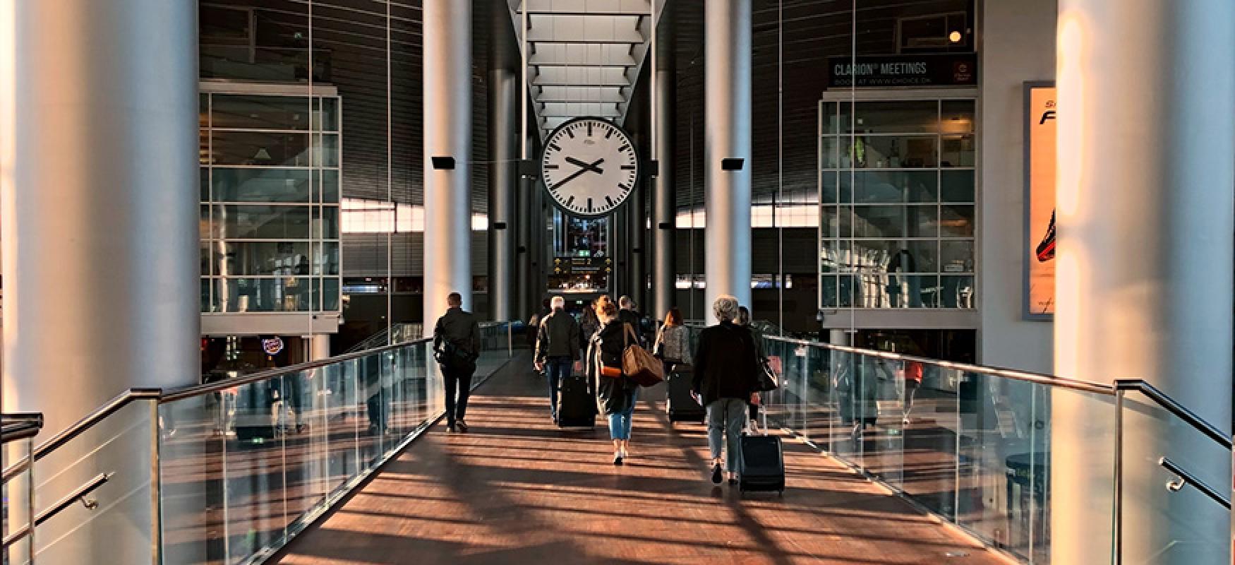 People walking with luggage