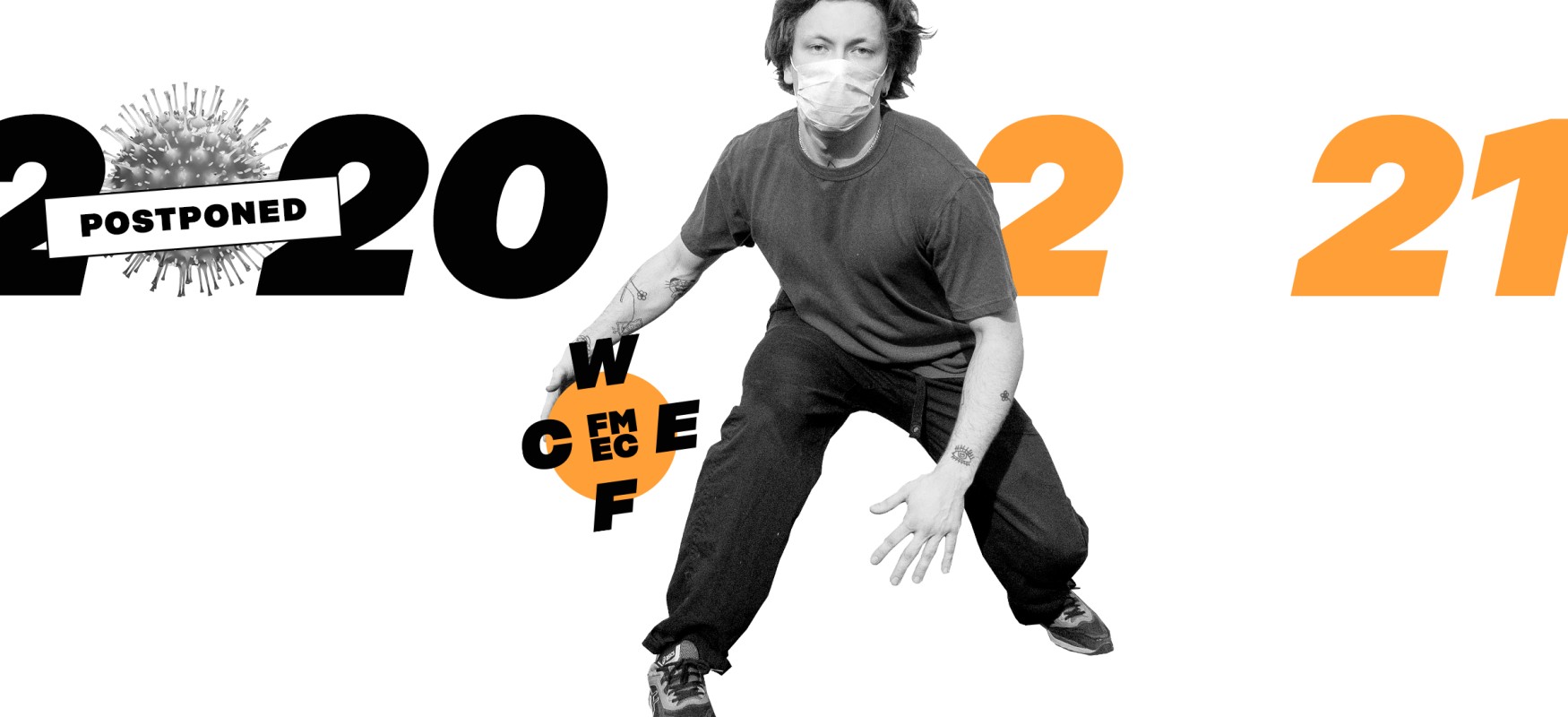 Man dribbling the WCEF logo. 2020 and 2021 displayed in the background.