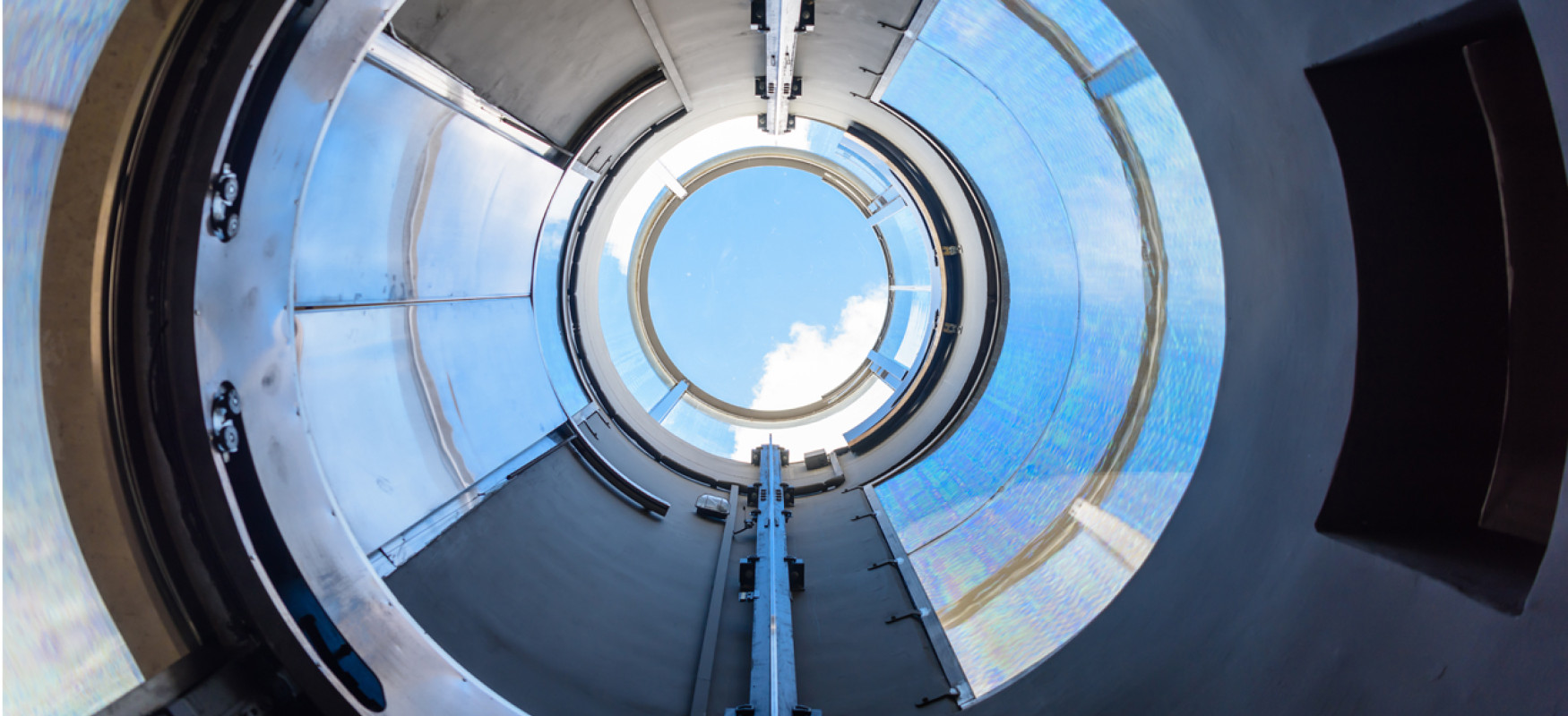 Looking up a round construction and seeing the sky