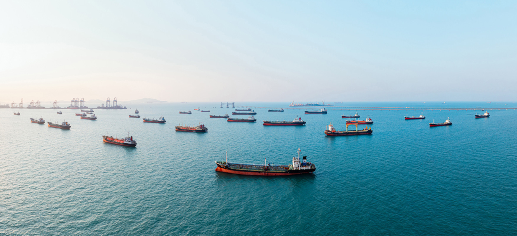 Multiple ships queuing up before entering the harbor