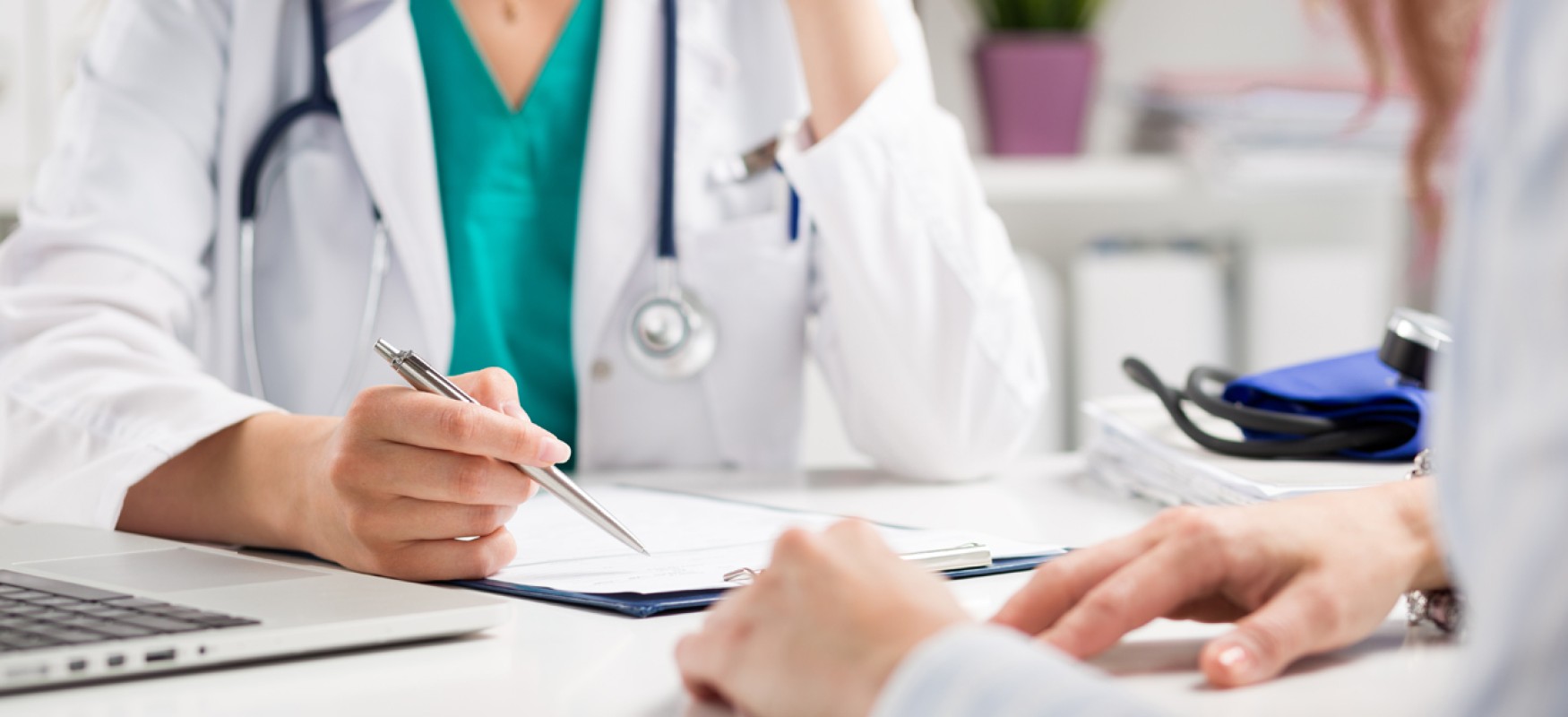 Doctor consulting a patient