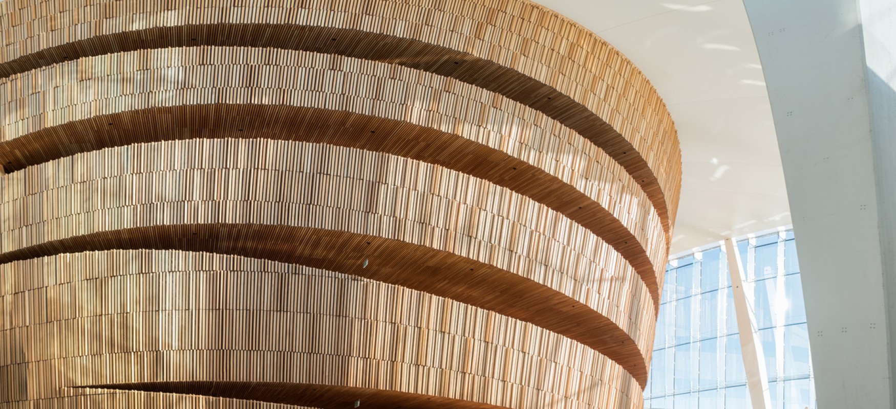 Rounded wood clad wall on gangway inside the Oslo Opera house